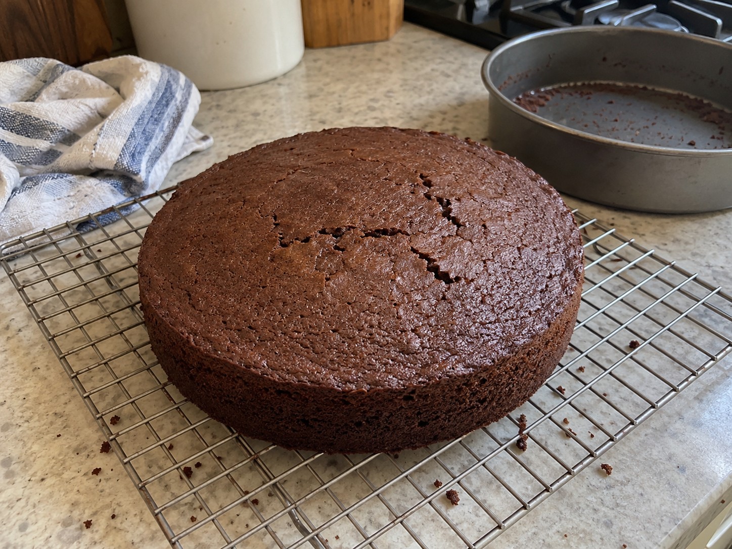 Easy chocolate cake layers cooling on a wire rack